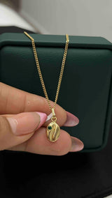 DIJE GRANO DE CAFÉ ZIRCON ORO AM 18K
