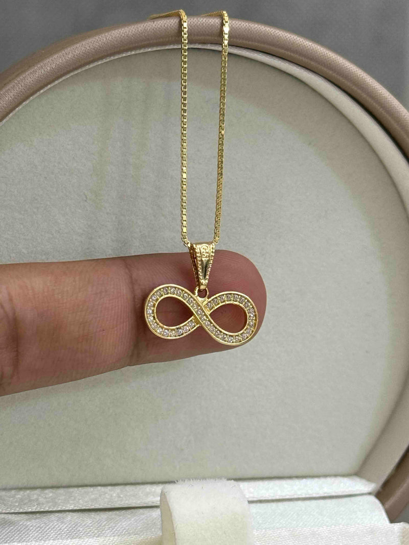 DIJE INFINITO ZURCON BL ORO AM 18K