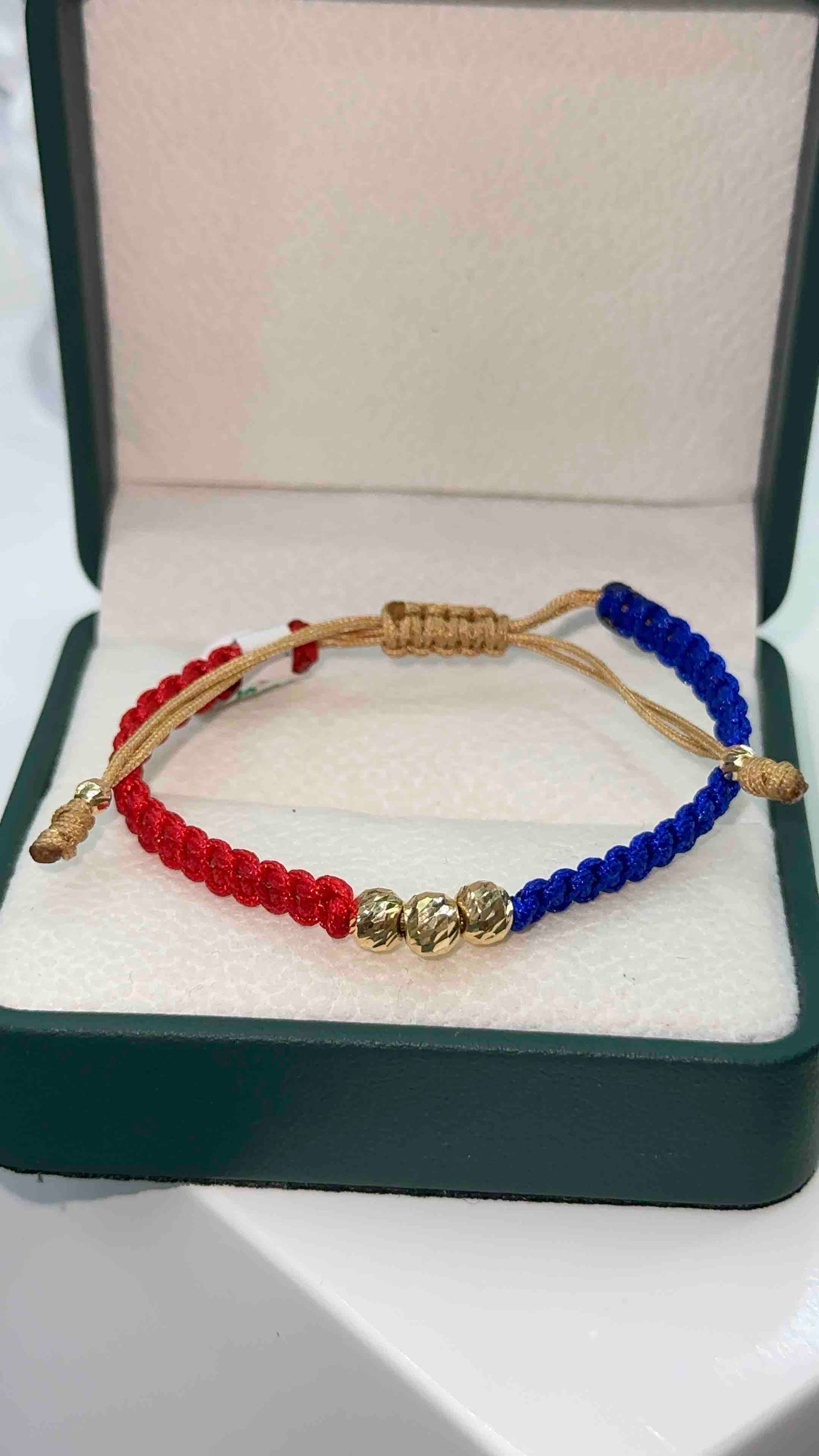 PULSERA TEJIDA AZUL Y ROJO