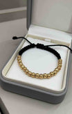 PULSERA TEJIDA CON BALINES #5