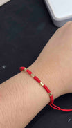 PULSERA TEJIDA CON CILINDROS DIAMANTADOS