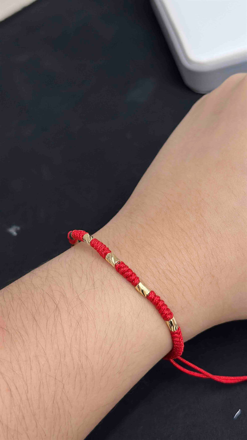 PULSERA TEJIDA CON CILINDROS DIAMANTADOS