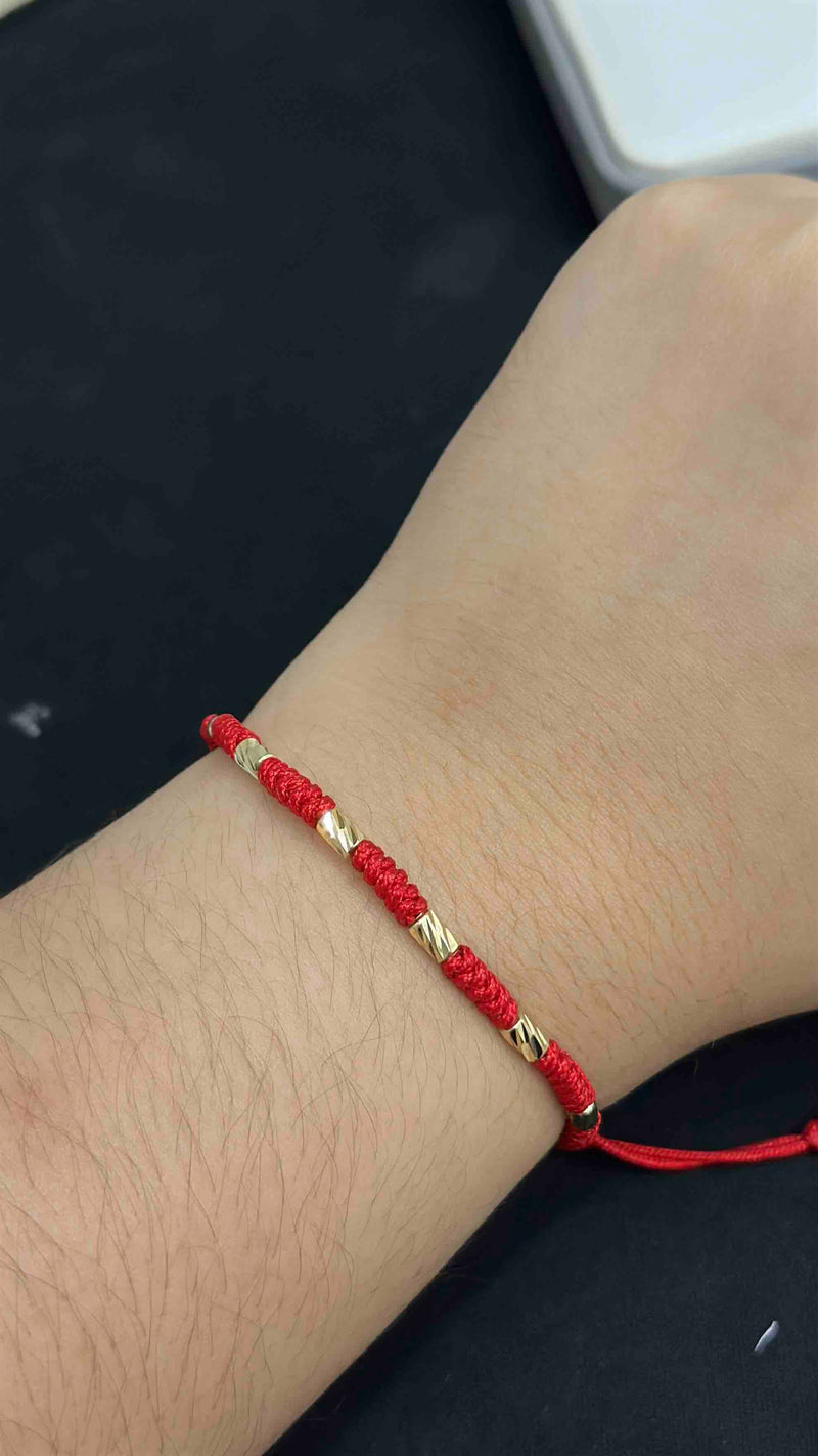 PULSERA TEJIDA CON CILINDROS DIAMANTADOS