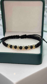 PULSERA TEJIDA NEGRA