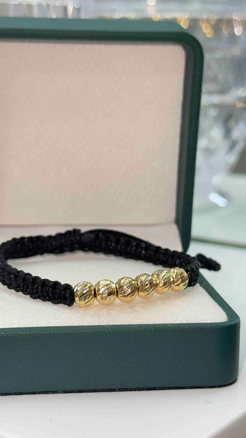 PULSERA TEJIDA NEGRA