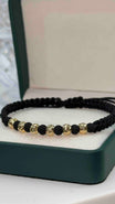 PULSERA TEJIDA NEGRA