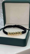 PULSERA TEJIDA NEGRA