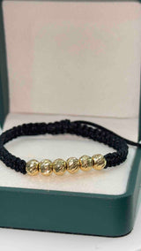 PULSERA TEJIDA NEGRA