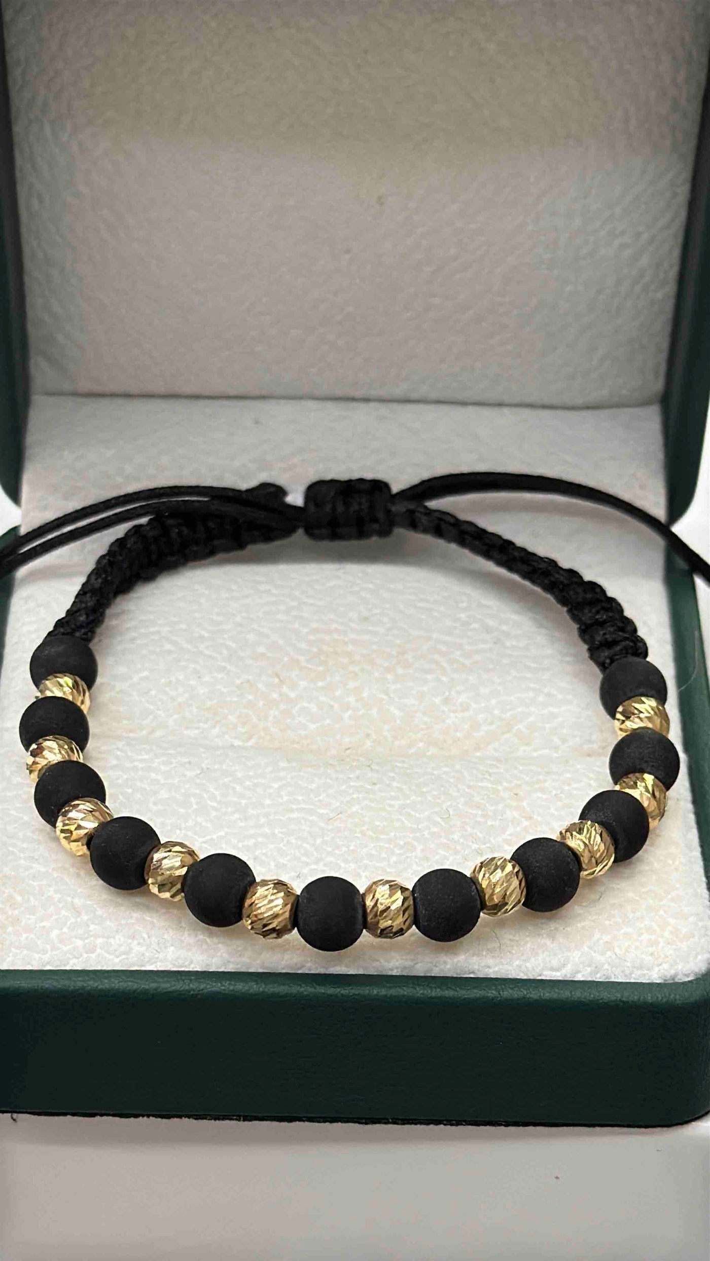 PULSERA TEJIDA ORO 18K NEGRA BOLAS NEOPRENO