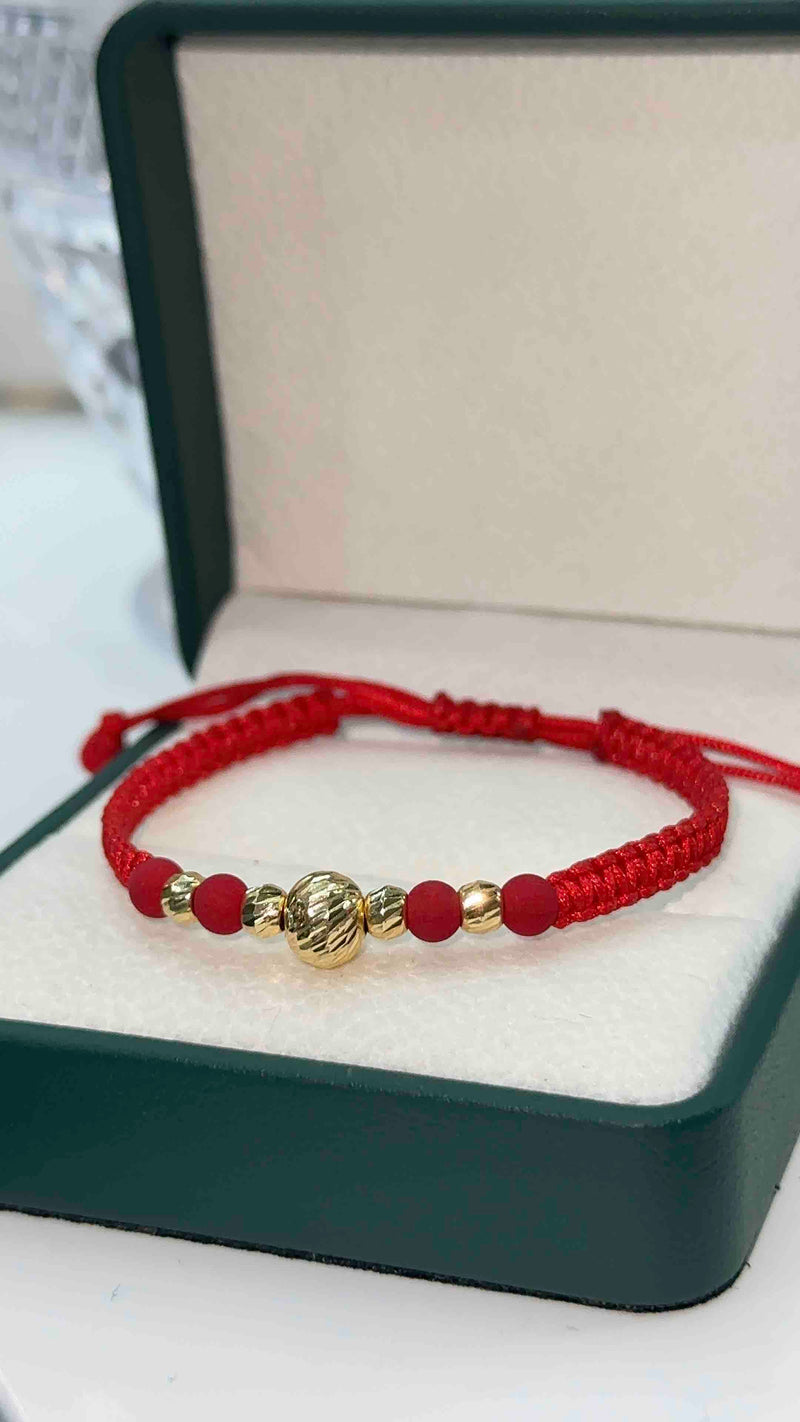 PULSERA TEJIDA ROJA BOLA
