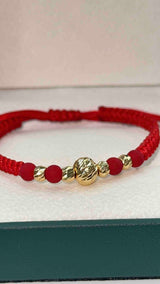 PULSERA TEJIDA ROJA BOLA