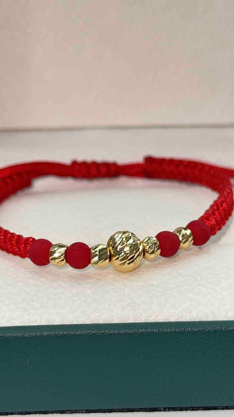 PULSERA TEJIDA ROJA BOLA