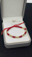 PULSERA TEJIDA ROJA TRES BALINES #4