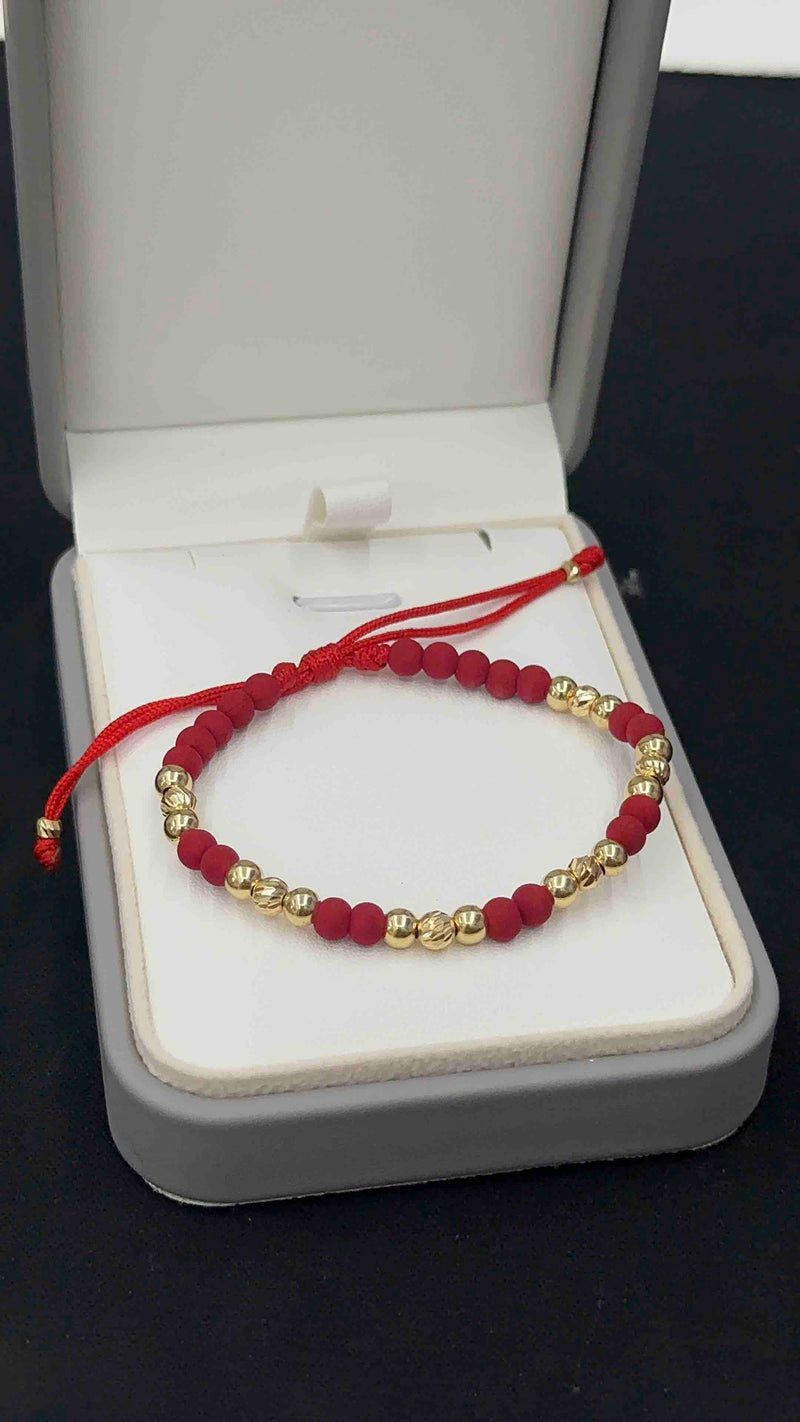 PULSERA TEJIDA ROJA TRES BALINES #4