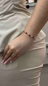 PULSERA TEJIDA ROJA TRES BALINES #4