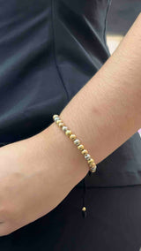PULSERA TEJIDA TRES OROS BALIN LISO #7